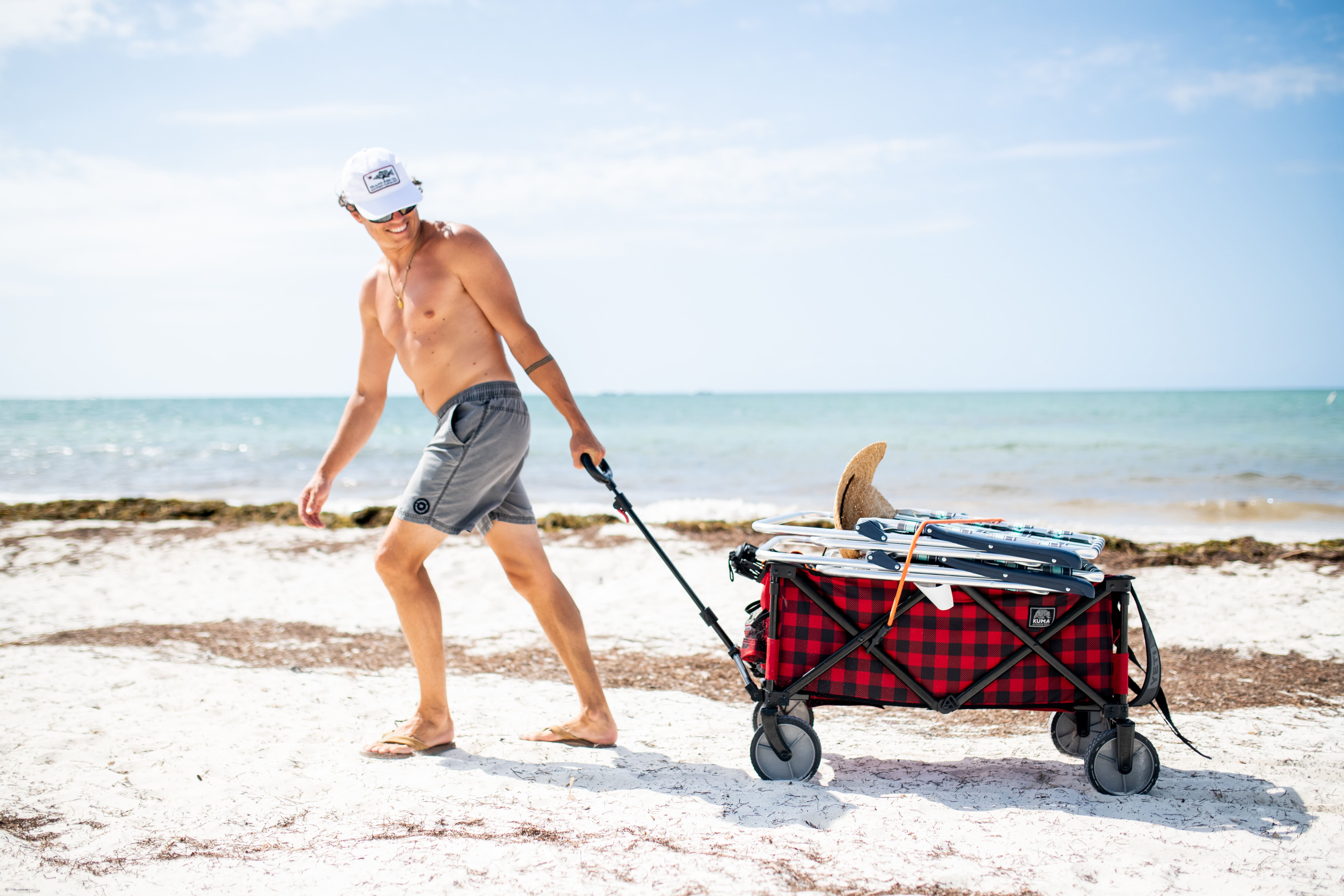 Man pulling buggy cart