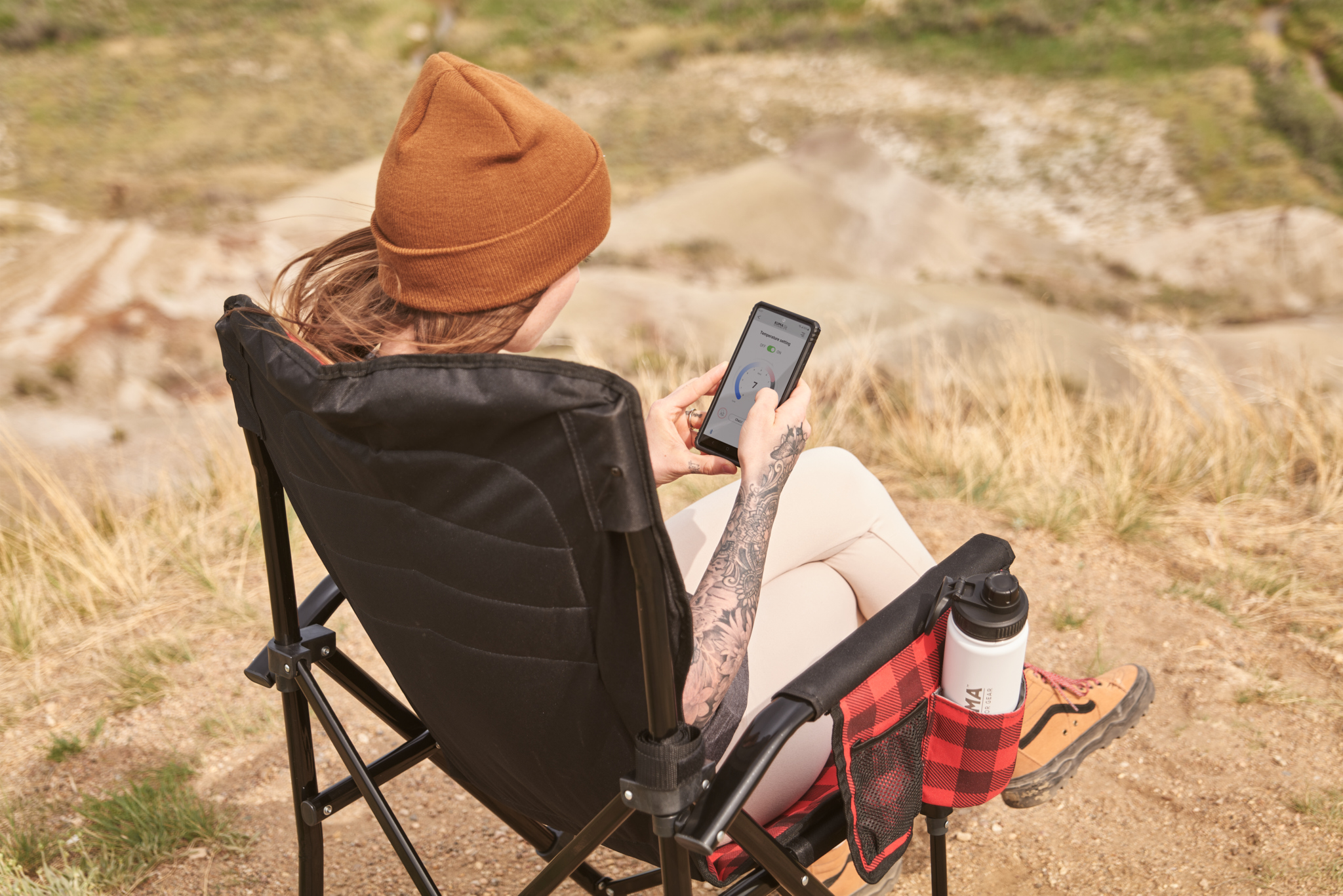 Woman on folding chair